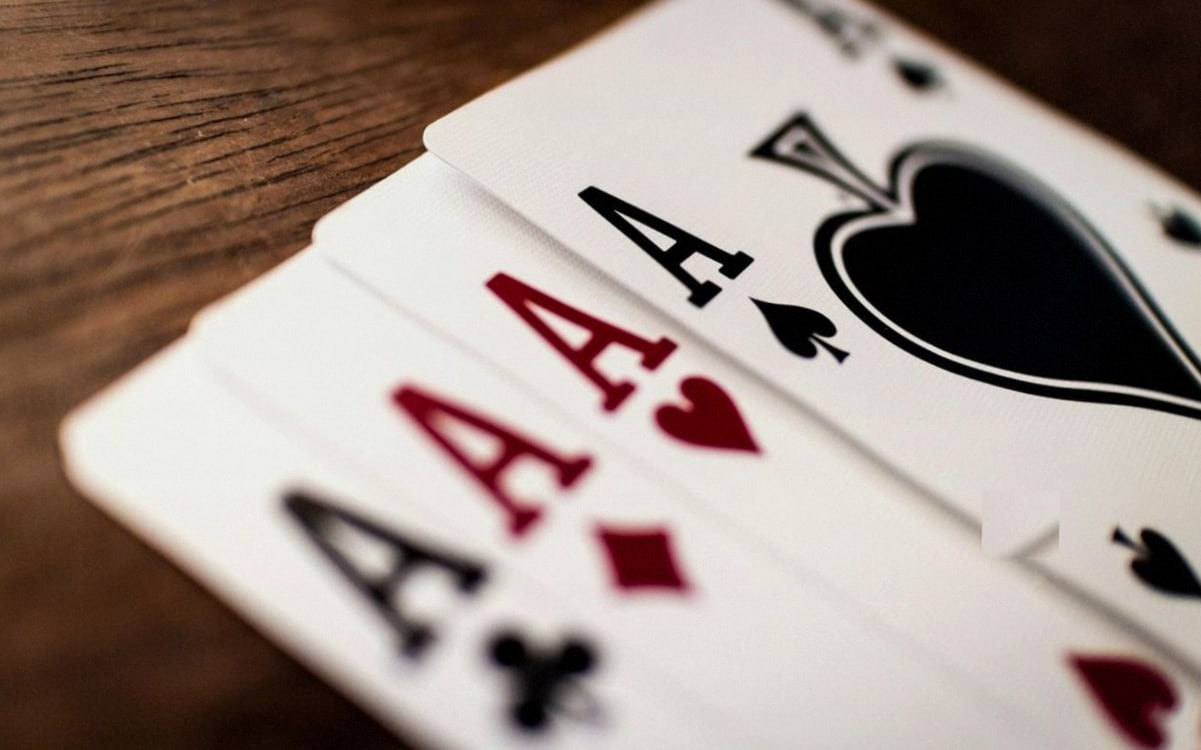 Playing cards arranged on a table at a social venue